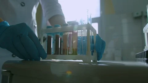 Laboratory assistant brings blood samples for test Stock Footage 112216252