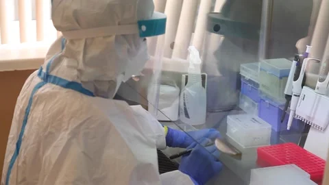 Laboratory assistant collects materials. works in the laboratory. Stock Footage 141883596