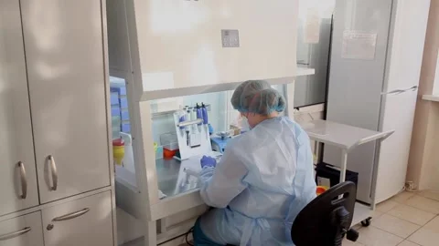 Laboratory assistant collects materials. works in the laboratory. Stock Footage 141893571