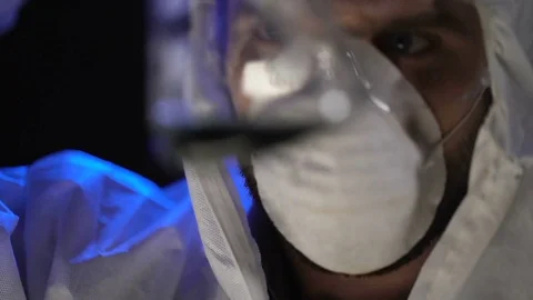 Laboratory assistant combined liquid reagents, manufacturing biological weapons Stock Footage 85083589