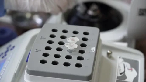 A laboratory assistant does a virus test Stock Footage 157358828