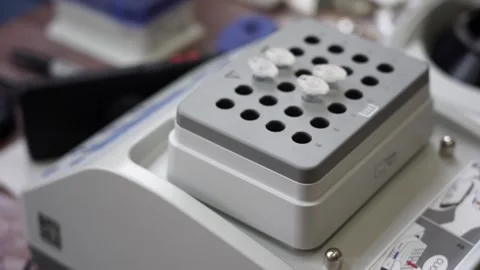 A laboratory assistant does a virus test Video stock 157358902