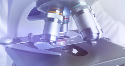 Laboratory assistant drips the solution for further examination under the Stock Footage 154325336