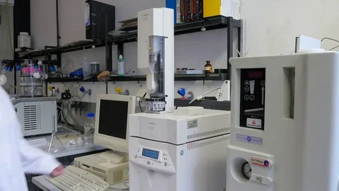 Laboratory assistant during her work at the Autosampler in the institute. Stock Footage 69310398