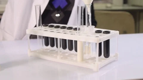 Laboratory assistant examines dairy products, milk in vitro Stock Footage 75224633