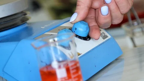 Laboratory assistant includes research equipment. Stock Footage 127321663