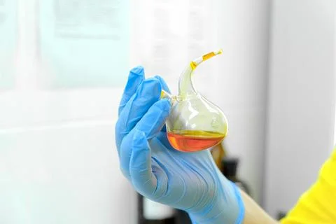 A laboratory assistant performs a chemical analysis of water Stock Photos