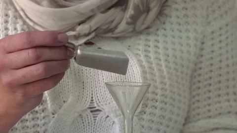 The laboratory assistant pours a special reagent into the flask with liquid Video stock 104943249