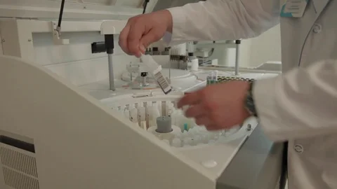 Laboratory assistant with reagents Stock Footage 80147614