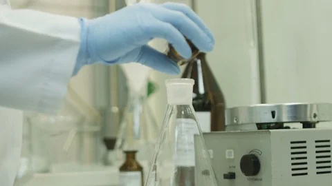 A laboratory assistant is working in the lab Stock Footage 71042239