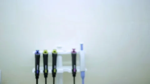Laboratory assistant working with samples of blood in test tubes Stock Footage 75907292