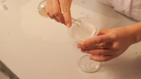 Laboratory assistant works with liquids Stock Footage 74578890