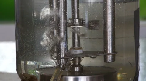 Laboratory bioreactor in action vertical panning up Stock Footage 62302282