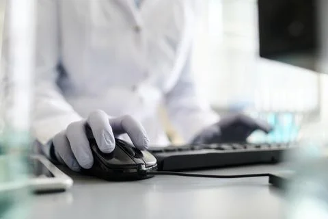 Laboratory Employee Using Computer Foto stock