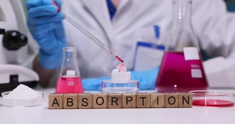 Laboratory Experiment Demonstrating the Absorption Process in Chemistry for Stock Footage 312183046