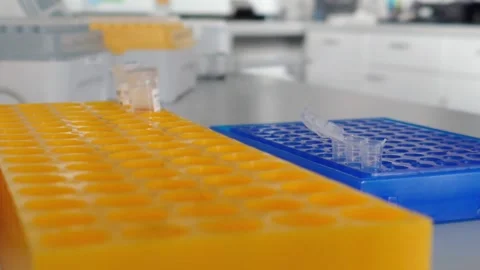 Laboratory experiment with a pipette and test tubes in a research lab 動画素材 301399201