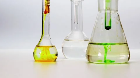 Laboratory flasks with liquid close-up on a white background. Medical laboratory Stock Footage 170639991