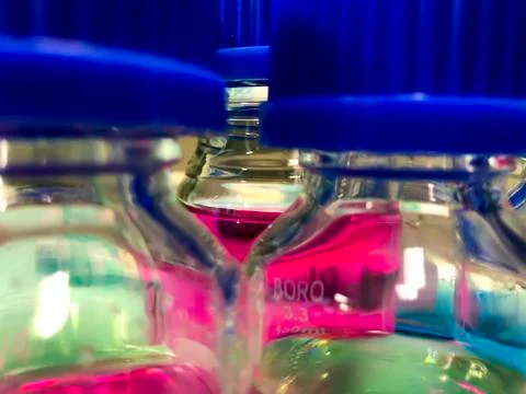Laboratory flasks with pink substance Stock-Fotos