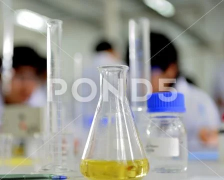Laboratory glassware containing colorful chemical liquid, lab research and de Stock Photos
