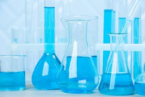 Laboratory glassware with test tubes. flasks, dropper, petri dishes, measurin Stock Photos