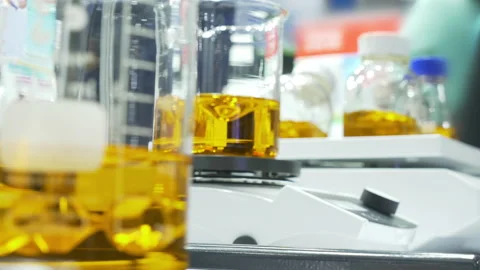 Laboratory liquid automatic stirrer glassware Stock Footage 149380169