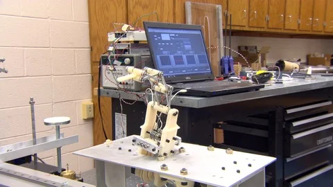 Laboratory machine moving back and forth Stock Footage 99053043