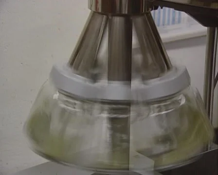 Laboratory machine shaking bottles with dry matter Stock Footage 53894913
