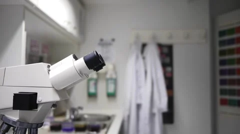 Laboratory with Male on the Microscope Stock Footage 1095950