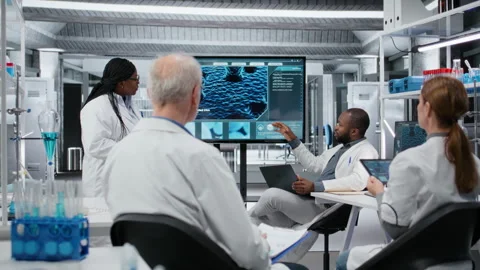 Laboratory manager presenting innovative drug development findings Stock Footage 325748667