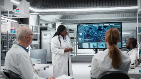 Laboratory manager presenting innovative drug development findings Stock Footage 327244885