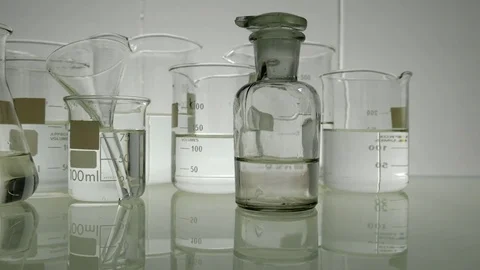 Laboratory material on a glass table. Dolly Stock Footage 82072847