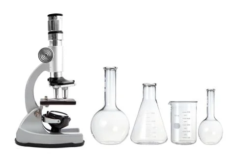 Laboratory metal microscope and empty test tubes isolated on white Foto stock