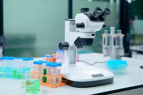 Laboratory Microscope and Test Tubes for Scientific Research and Analysis Stock Photos