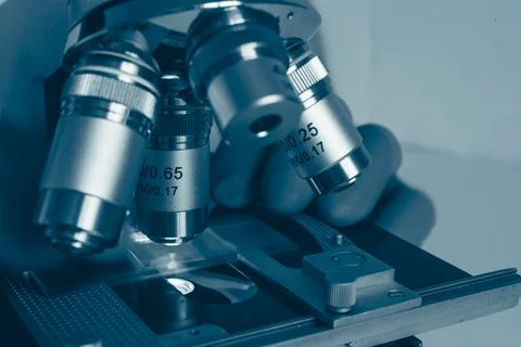 Laboratory microscope with cold blue light Stock Photos