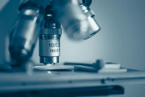 Laboratory microscope with cold blue light Stock Photos