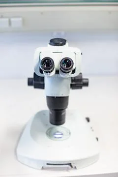 Laboratory microscope isolated on white close up Stock Photos