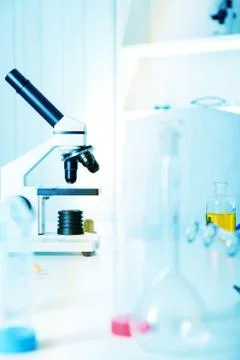 Laboratory microscope lens.modern microscopes in a lab. toned im Stock Photos