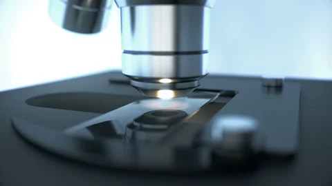 Laboratory microscope science research inspecting chemical drop on sample slide Stock Footage 114867549
