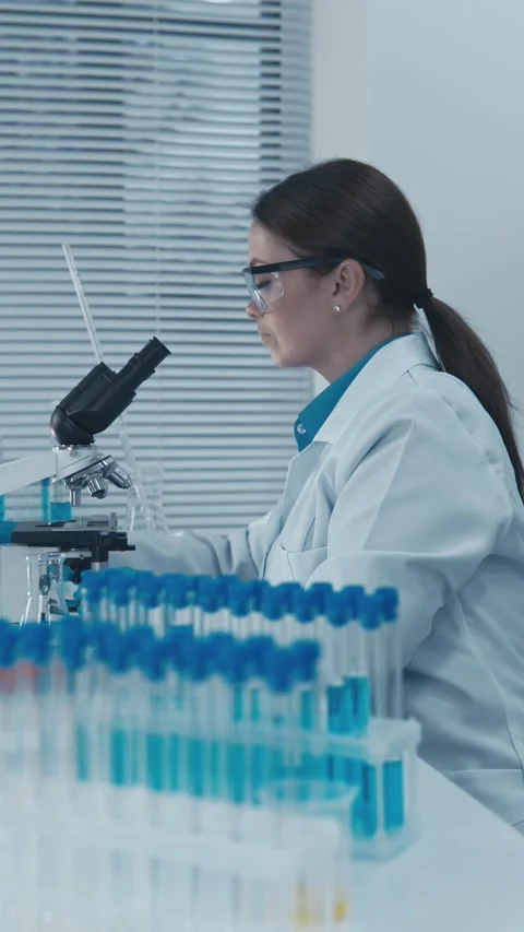 In the laboratory, the pharmacist-analyst controls the quality and purity of Video stock 266562016