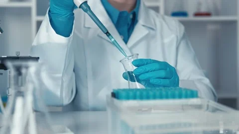 Laboratory Research The Art of Precision Pipetting in Action for Accurate and Stock Footage 317033491