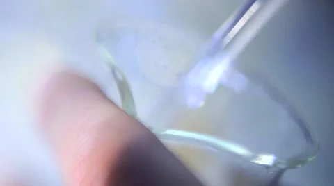 Laboratory - Rotating glass stick in the flask Stock-Footage 51784565