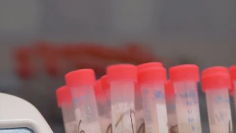Laboratory samples mixing and turning Stock Footage 87804674