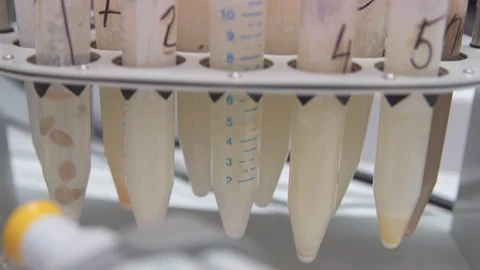 Laboratory samples mixing and turning Stock Footage 87804924