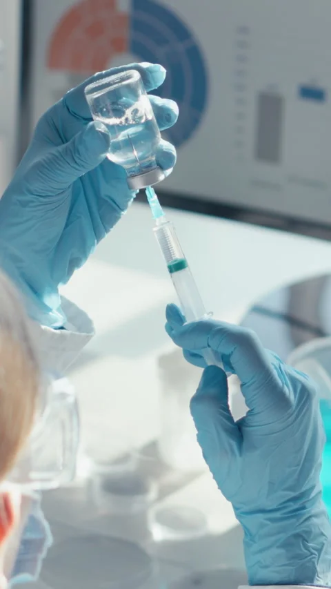 In the laboratory, a scientist demonstrates precision in biochemistry and Stock Footage 279217543