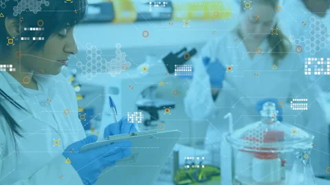 Laboratory scientist pipetting sample and initiating overlays as peer writing Stock Footage 313328177