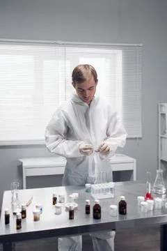 Laboratory scientist working in a lab with test tubes Stock Photos