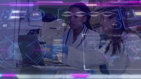 Laboratory scientists placing tube under microscope typing on laptop tracking Stock Footage 317869791