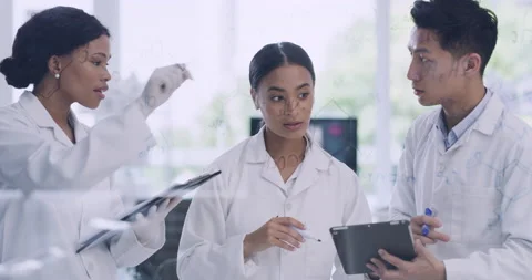 Laboratory scientists using digital tablet while brainstorming and discussing Stock Footage 200794668