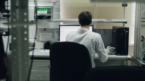 Laboratory with scribblers and scientists Stock Footage 128169241