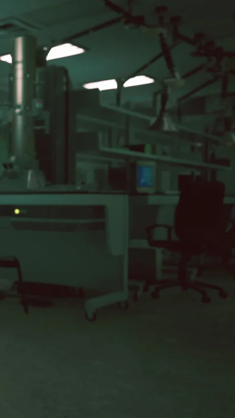 Laboratory setting with equipment and empty chairs in a quiet room Stock Footage 338420535